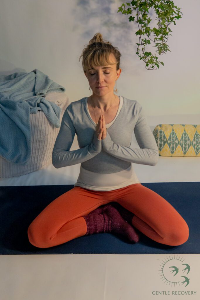 India in a yoga meditation pose